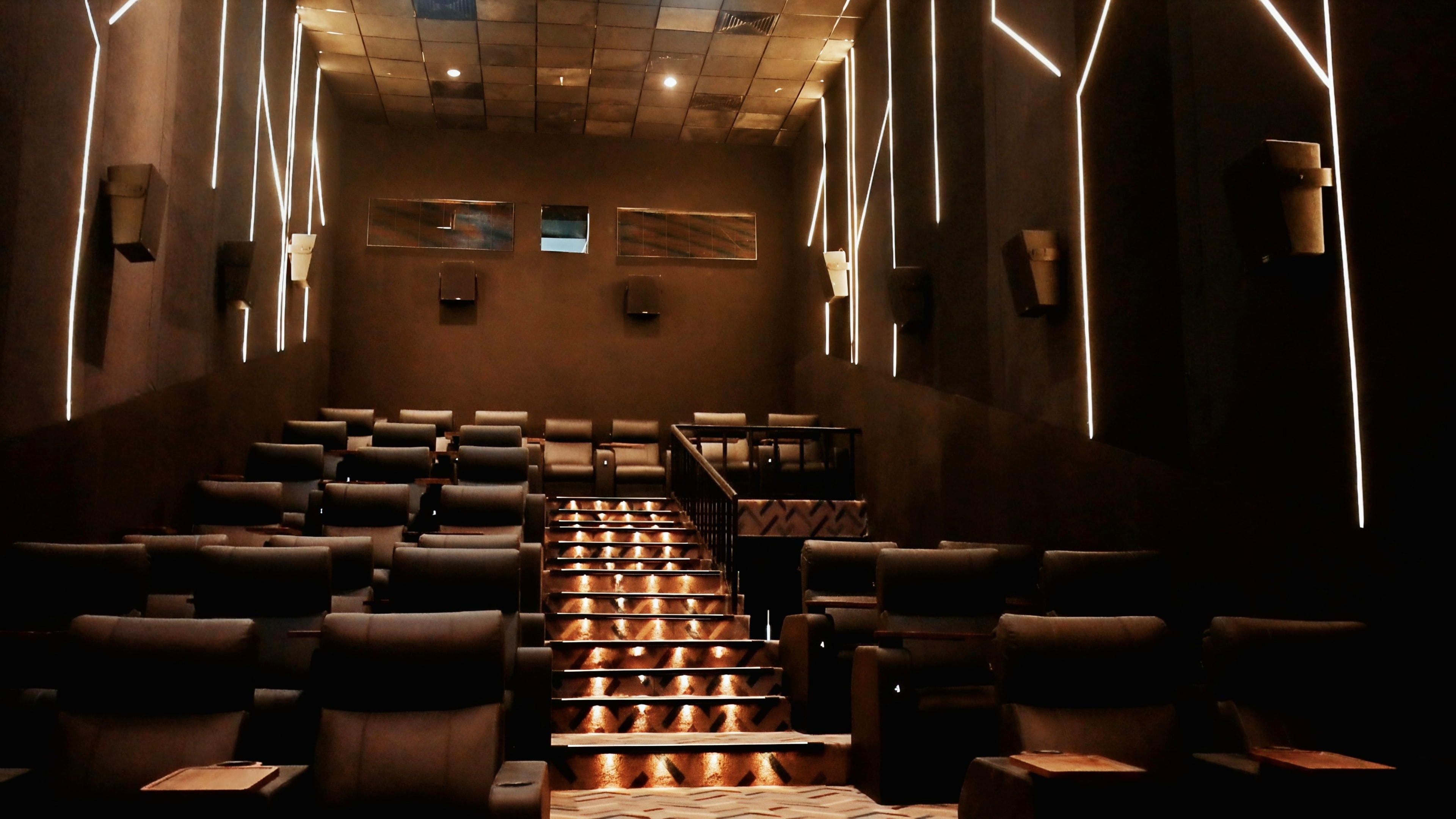 JP DD Cinemas Satna luxury auditorium warm lighting